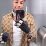 Why Does Blueface Wear Rubber Gloves?
